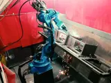 Robot arm welding parts